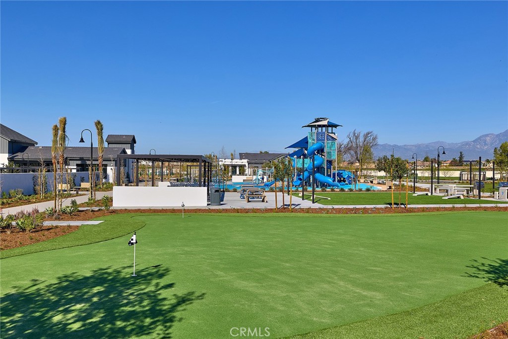 5911 Rockport Road Eastvale, CA 92880 - Photo 33 of 39 a view of a fountain in front of house