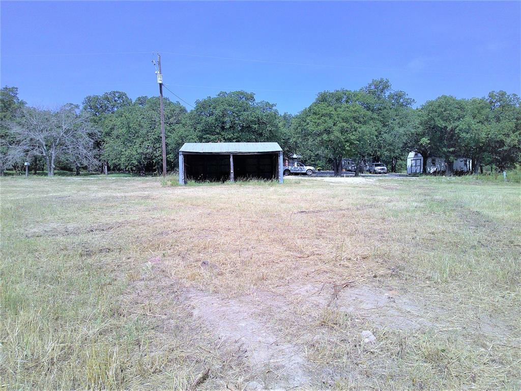 6 Border Street Montague, TX 76251 - Photo 4 of 6 a big yard with trees
