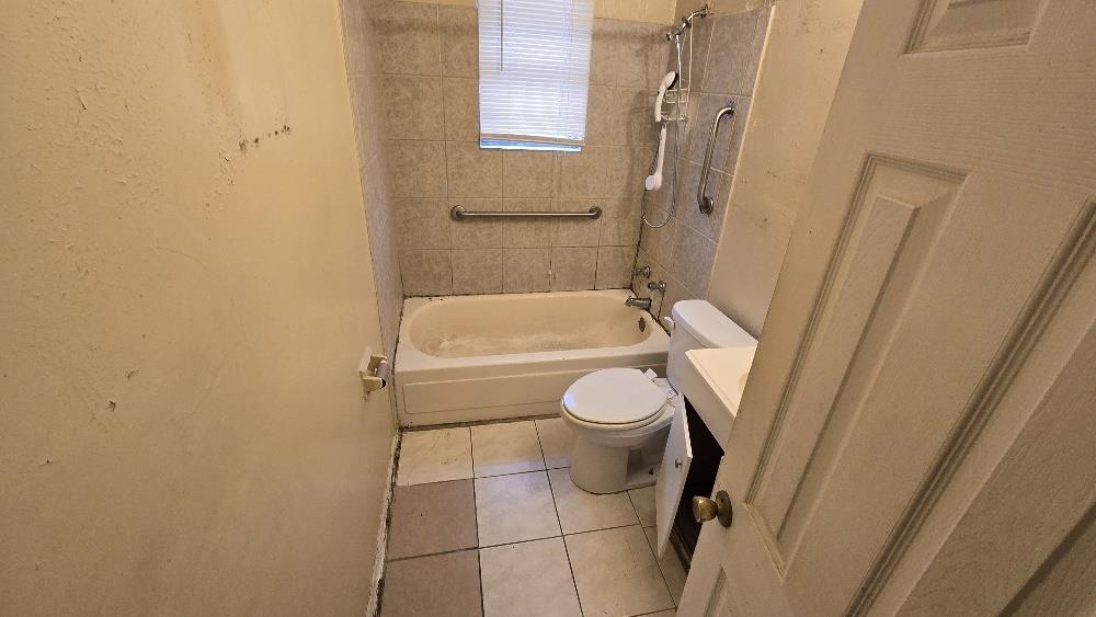 753 King Road Memphis, TN 38109 - Photo 6 of 17 a bathroom with a sink and toilet
