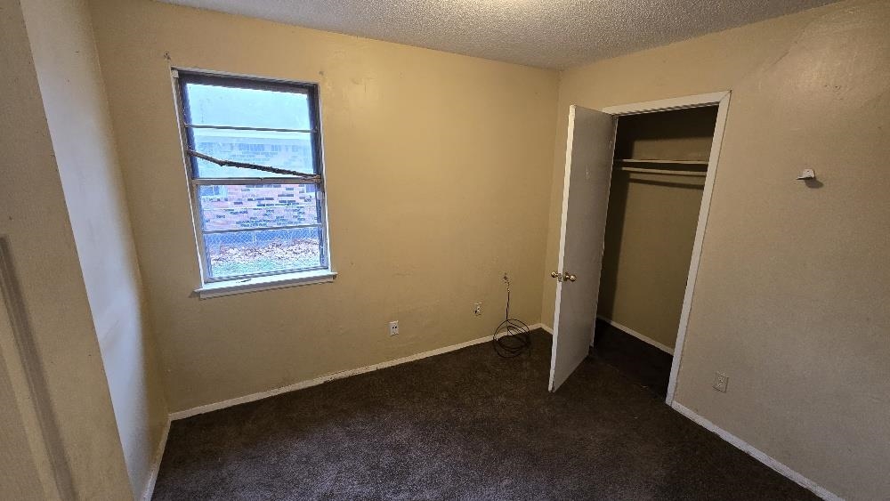 753 King Road Memphis, TN 38109 - Photo 8 of 17 an empty room with windows and closet