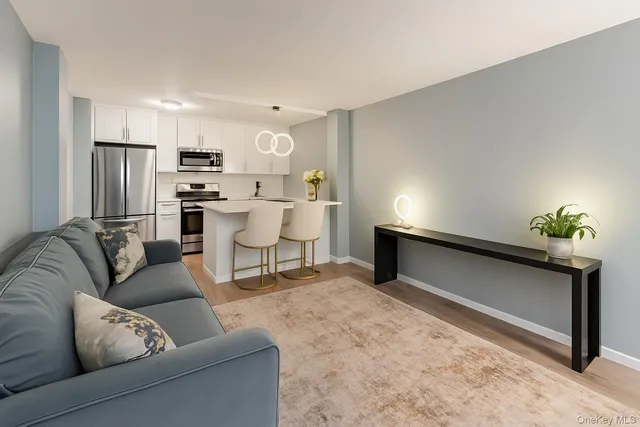 a living room with furniture and a couch