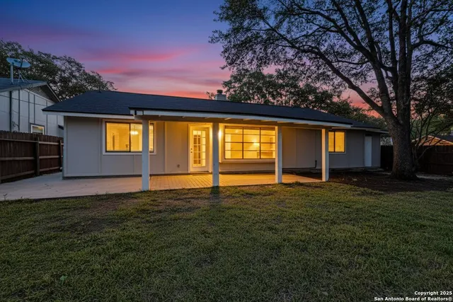 a view of a house with a big yard