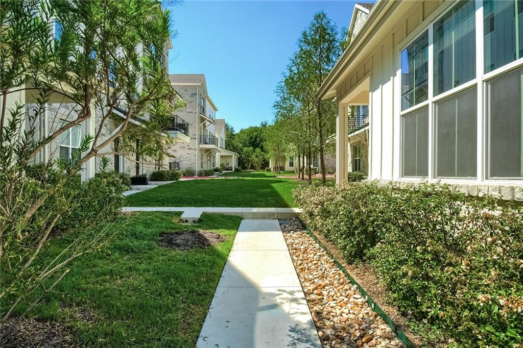 2624 Metcalfe Road, Unit 7 Austin, TX 78741 - Photo 1 of 31 a view of backyard with plants and trees