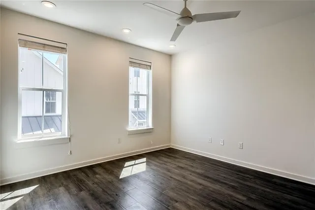 a kitchen with kitchen island a counter top a stove a sink and a refrigerator