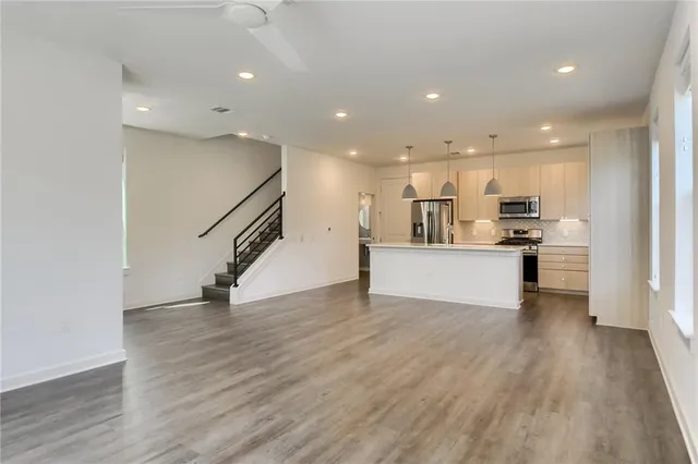 a picture of a bench in front of a wall