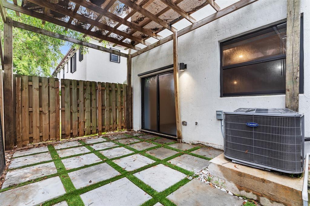 340 Northeast 208th Terrace, Unit 340 Miami, FL 33179 - Photo 31 of 38 a view of outdoor space