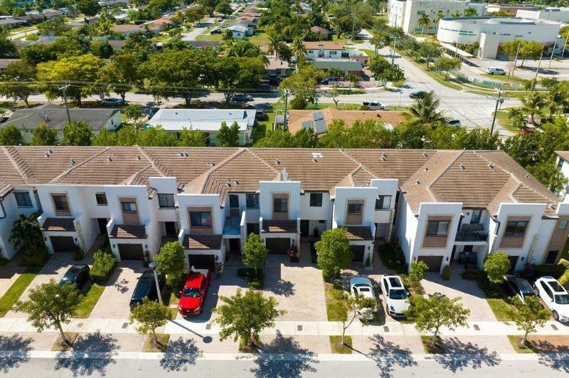 340 Northeast 208th Terrace, Unit 340 Miami, FL 33179 - Photo 33 of 38 an aerial view of multiple house