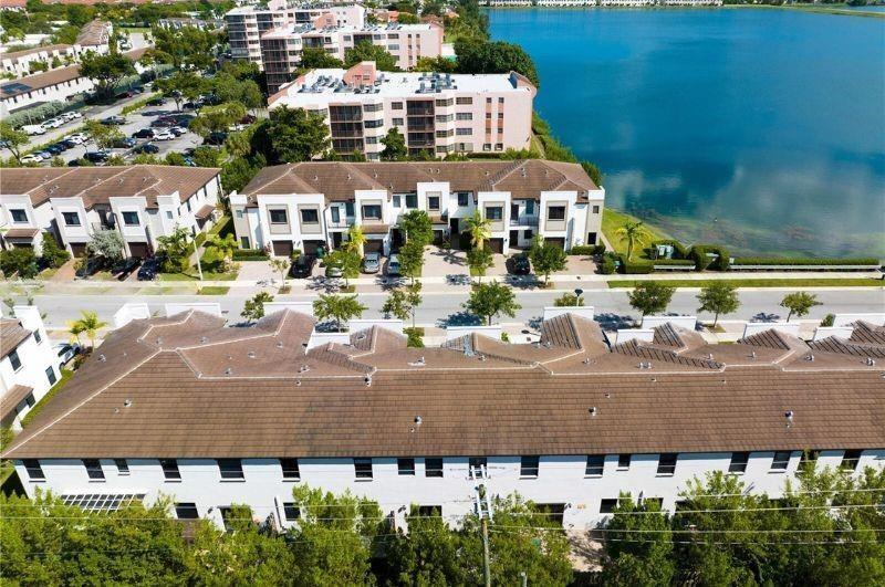 340 Northeast 208th Terrace, Unit 340 Miami, FL 33179 - Photo 35 of 38 an aerial view of a house with outdoor space