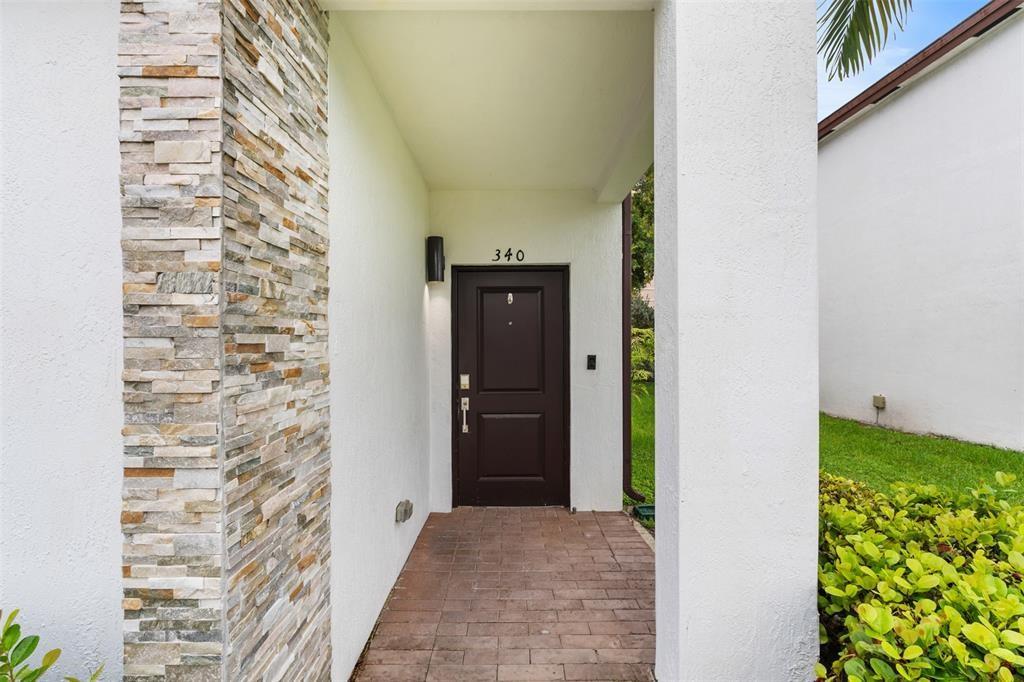 340 Northeast 208th Terrace, Unit 340 Miami, FL 33179 - Photo 4 of 38 a view of entryway