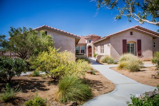 128 West Franklin Avenue Ridgecrest, CA 93555 - Photo 1 of 35 front view of a house with a yard