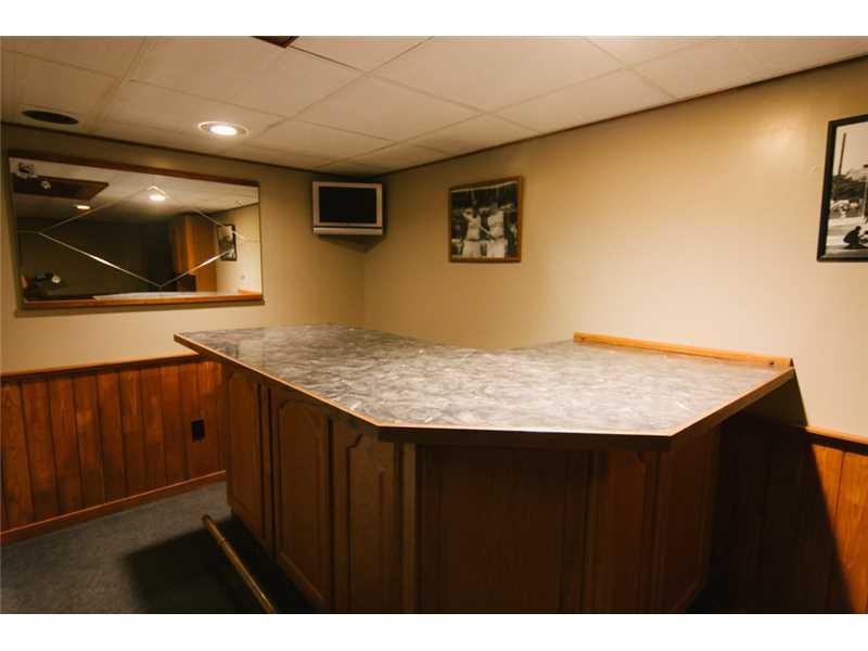 5211 Meadowcrest Road Baldwin, PA 15236 - Photo 22 of 25 Basement/Game Room. Plus bar area to relax and enjoy your game room.
