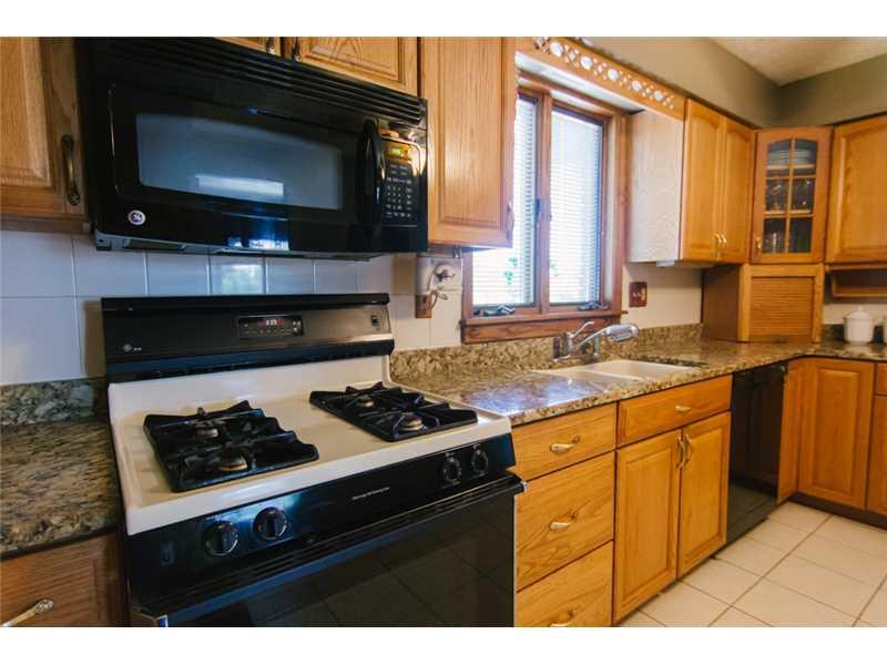 5211 Meadowcrest Road Baldwin, PA 15236 - Photo 6 of 25 Kitchen. Updated kitchen with granite counter top