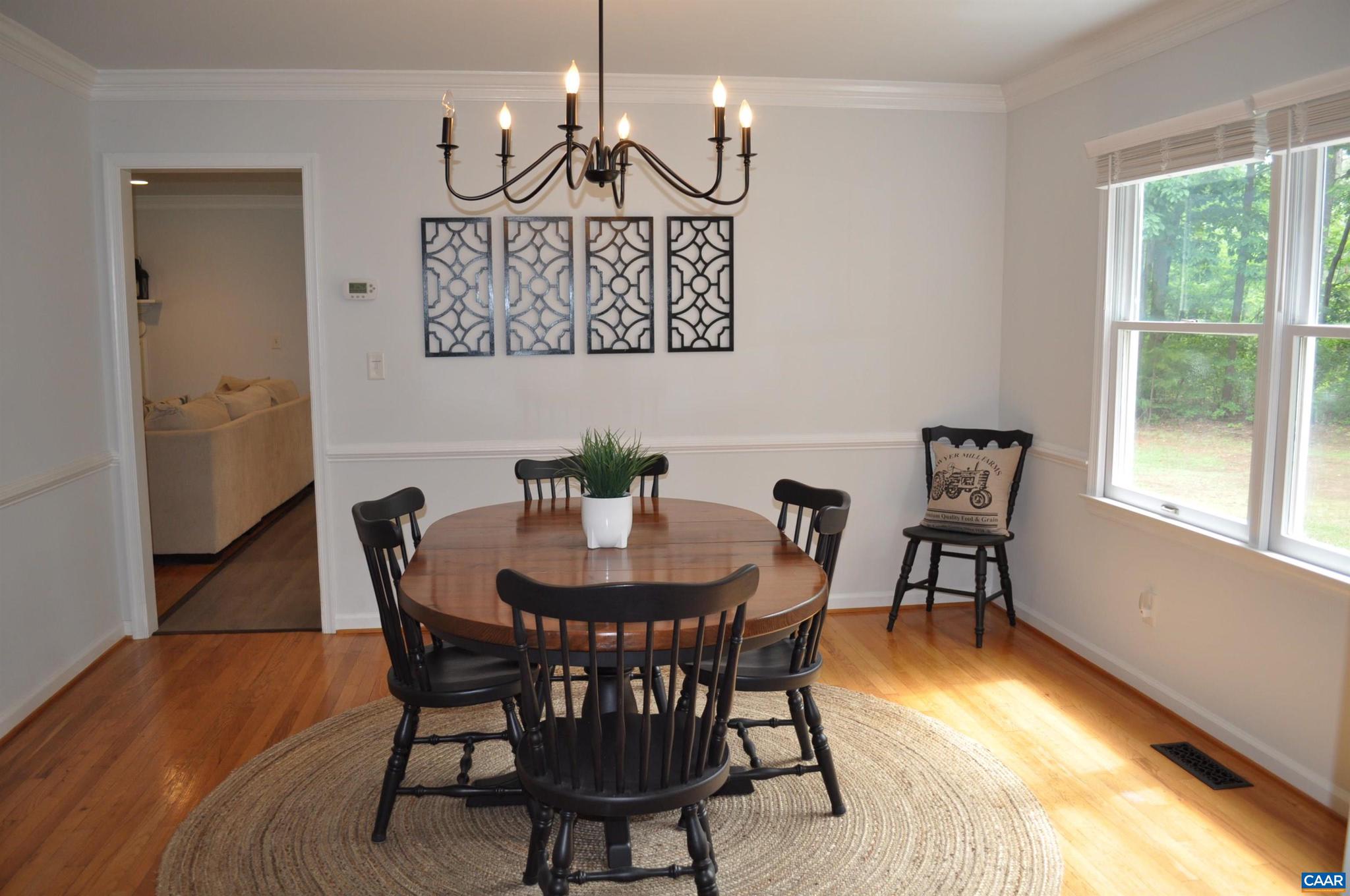 3257 Martin Kings Road Charlottesville, VA 22902 - Photo 10 of 49 a view of a dining room with furniture window and wooden floor