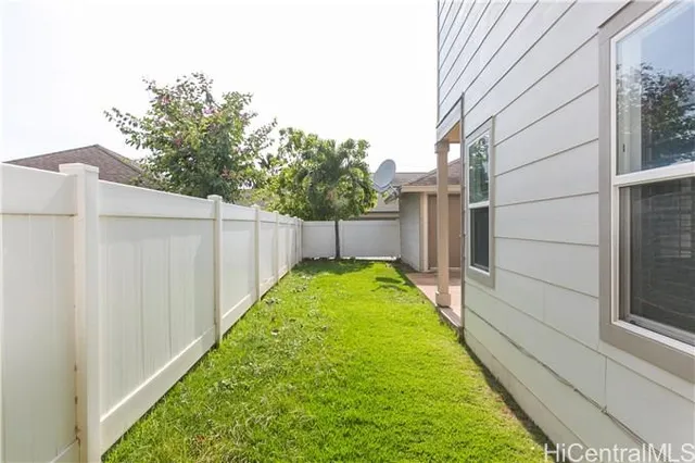a view of a backyard with stairs