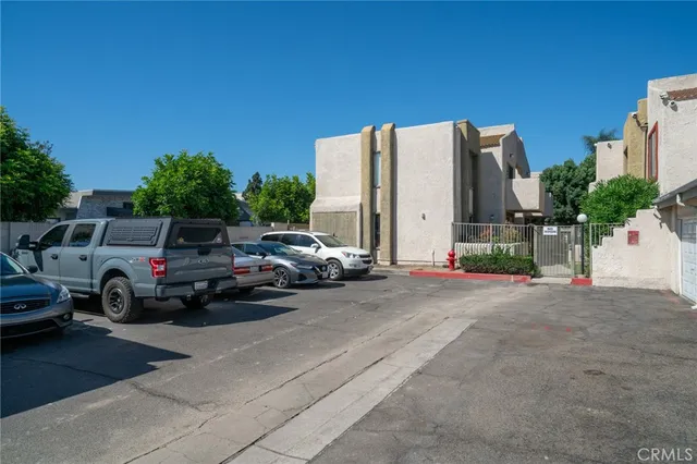 a view of a street with cars