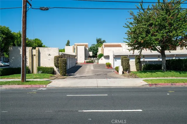 a view of a house with a street