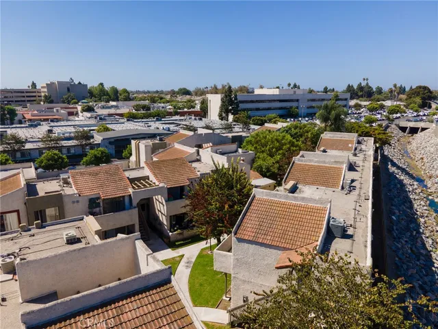 an aerial view of a house with a garden