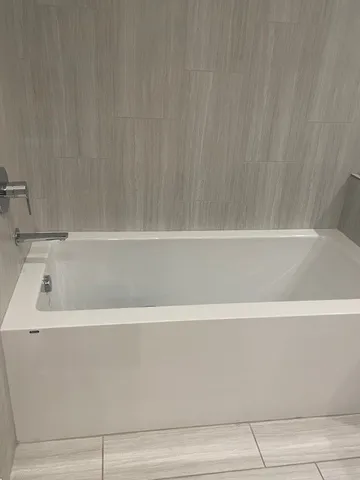 a bathroom with a bathtub