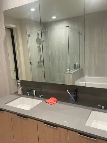 a bathroom with a sink and a mirror