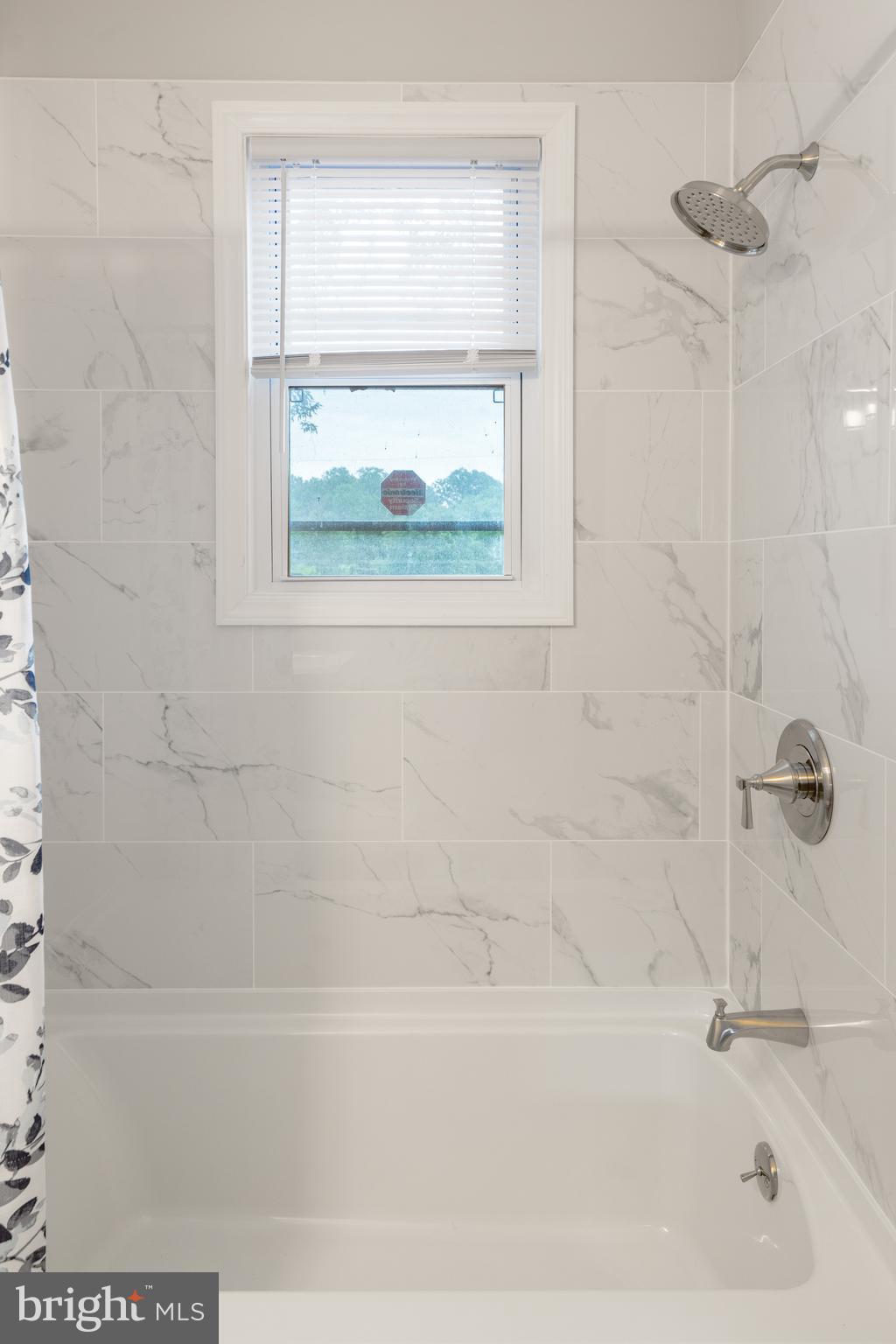 8113 Analee Avenue Rosedale, MD 21237 - Photo 19 of 34 Custom Tile in the Bathroom