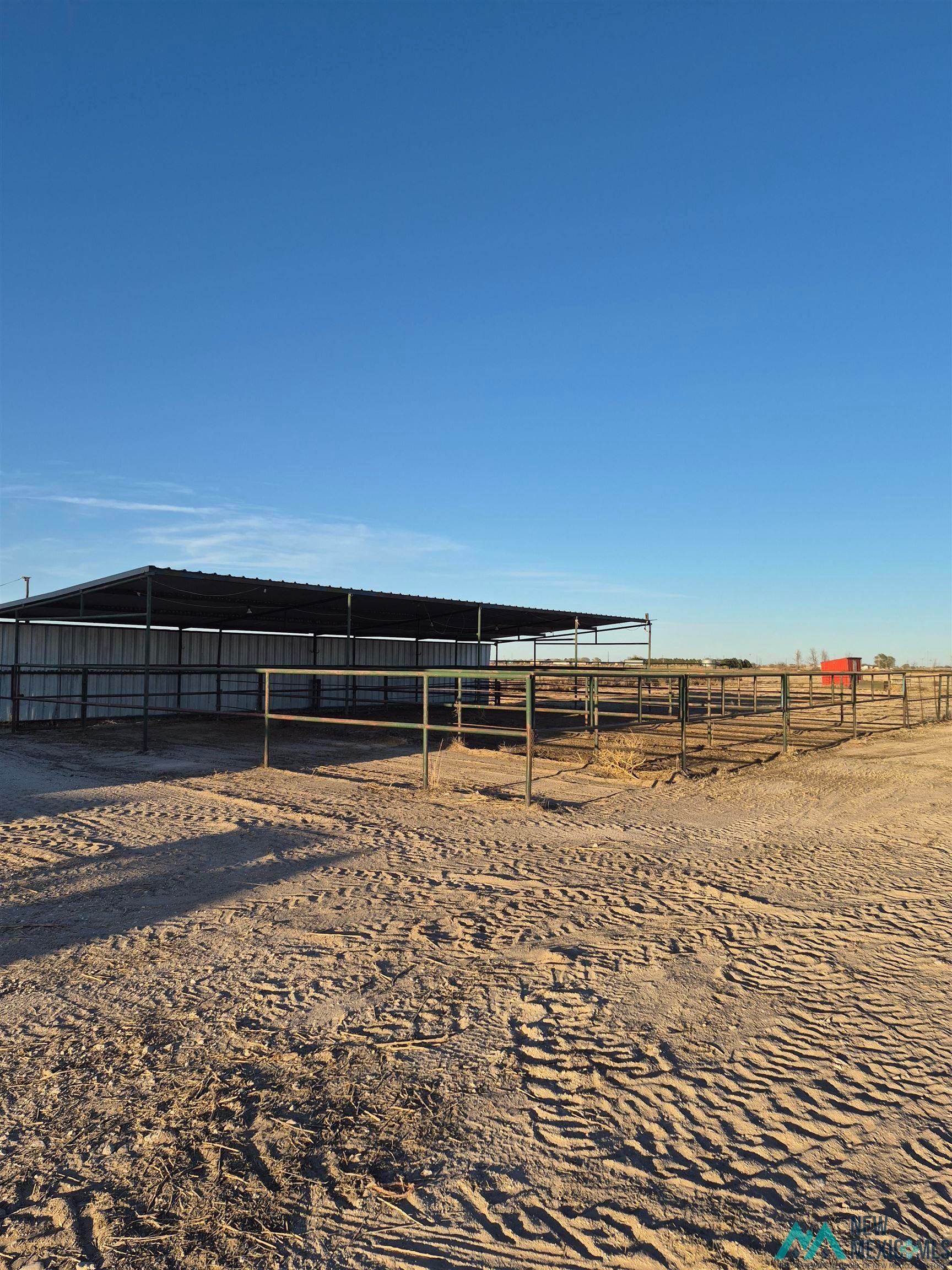 751 South Roosevelt Rd R 1/2 Portales, NM 88130 - Photo 20 of 21 View of yard with an outdoor structure and a rural view