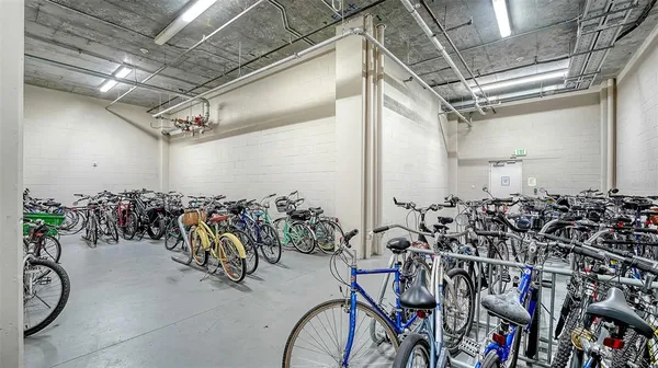 a living room with a couch and a chandelier