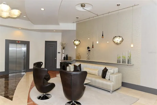 a living room with furniture rug and view of living room