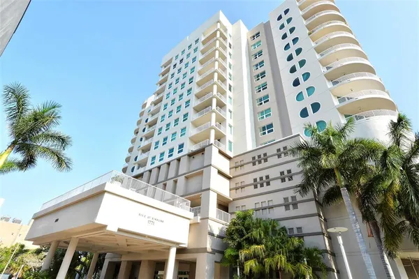a view of a multi story buildings