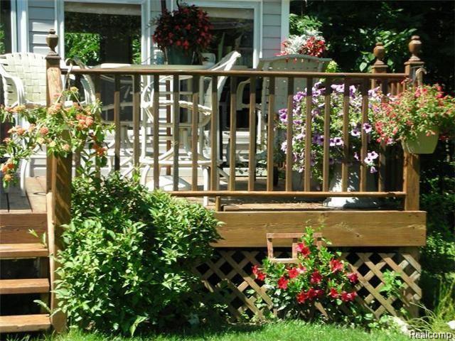 7180 McGuire Road Fenton, MI 48430 - Photo 47 of 50 Deck with landscaping