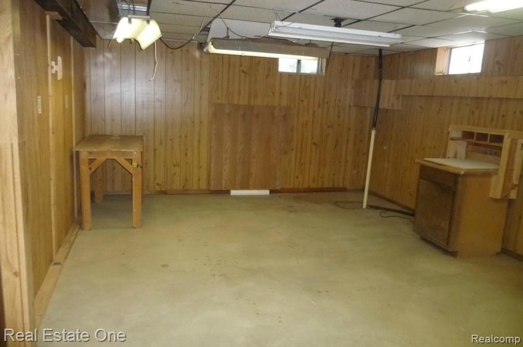 5981 West Hayner Road Fowlerville, MI 48836 - Photo 26 of 31 BASEMENT WORKSHOP AREA