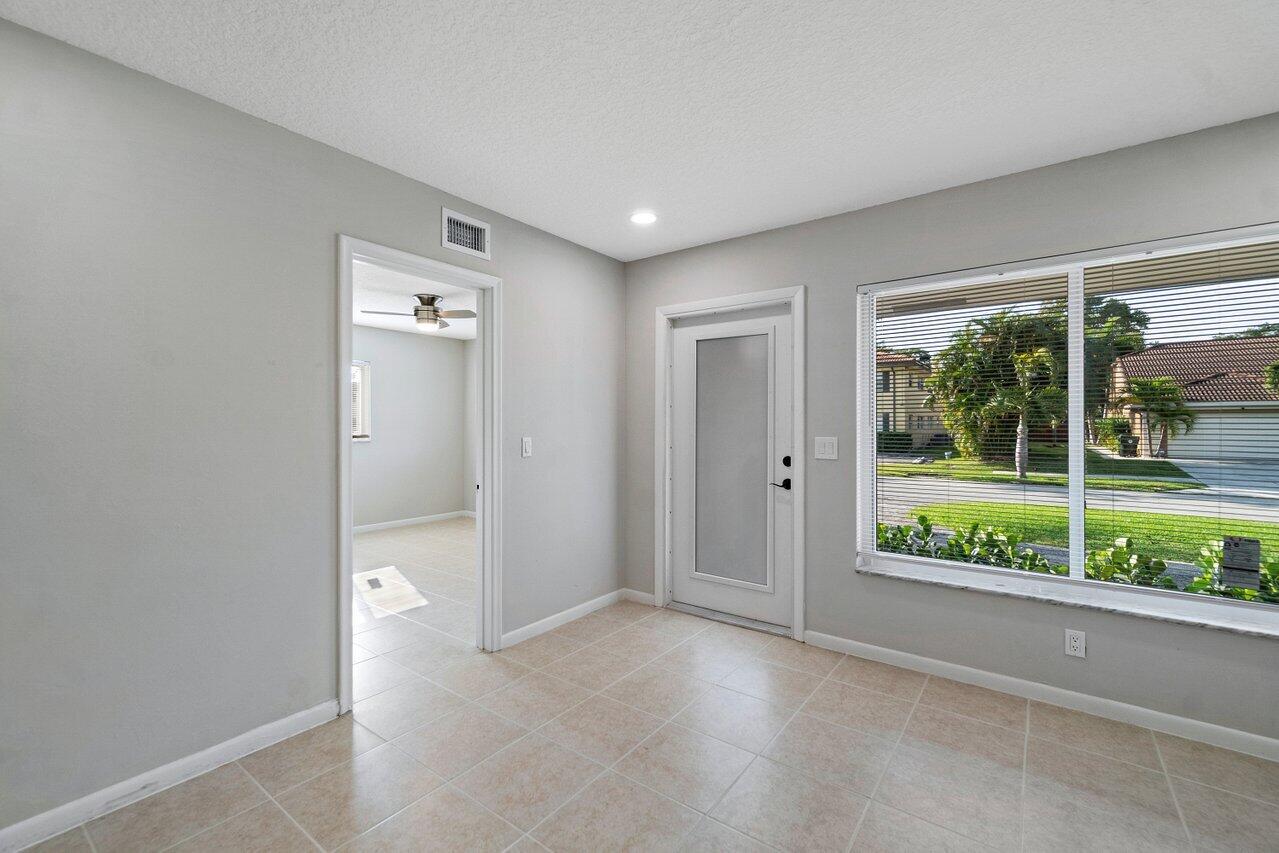209 Southwest 6th Street, Unit 209 Boca Raton, FL 33432 - Photo 16 of 37 wooden floor in a room