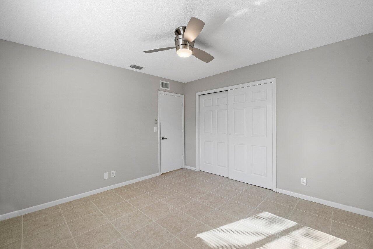 209 Southwest 6th Street, Unit 209 Boca Raton, FL 33432 - Photo 21 of 37 a view of an empty room