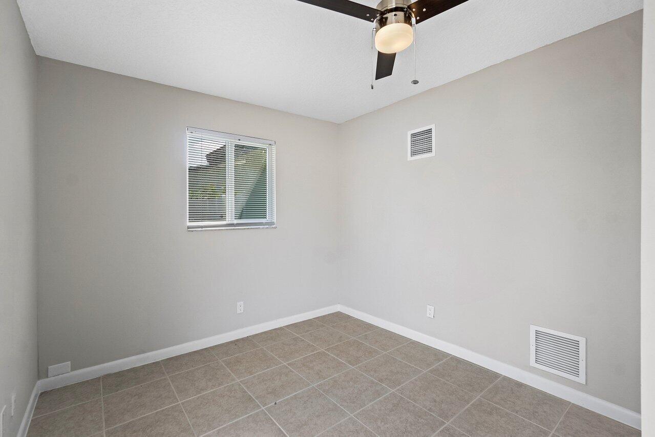 209 Southwest 6th Street, Unit 209 Boca Raton, FL 33432 - Photo 24 of 37 a view of an empty room