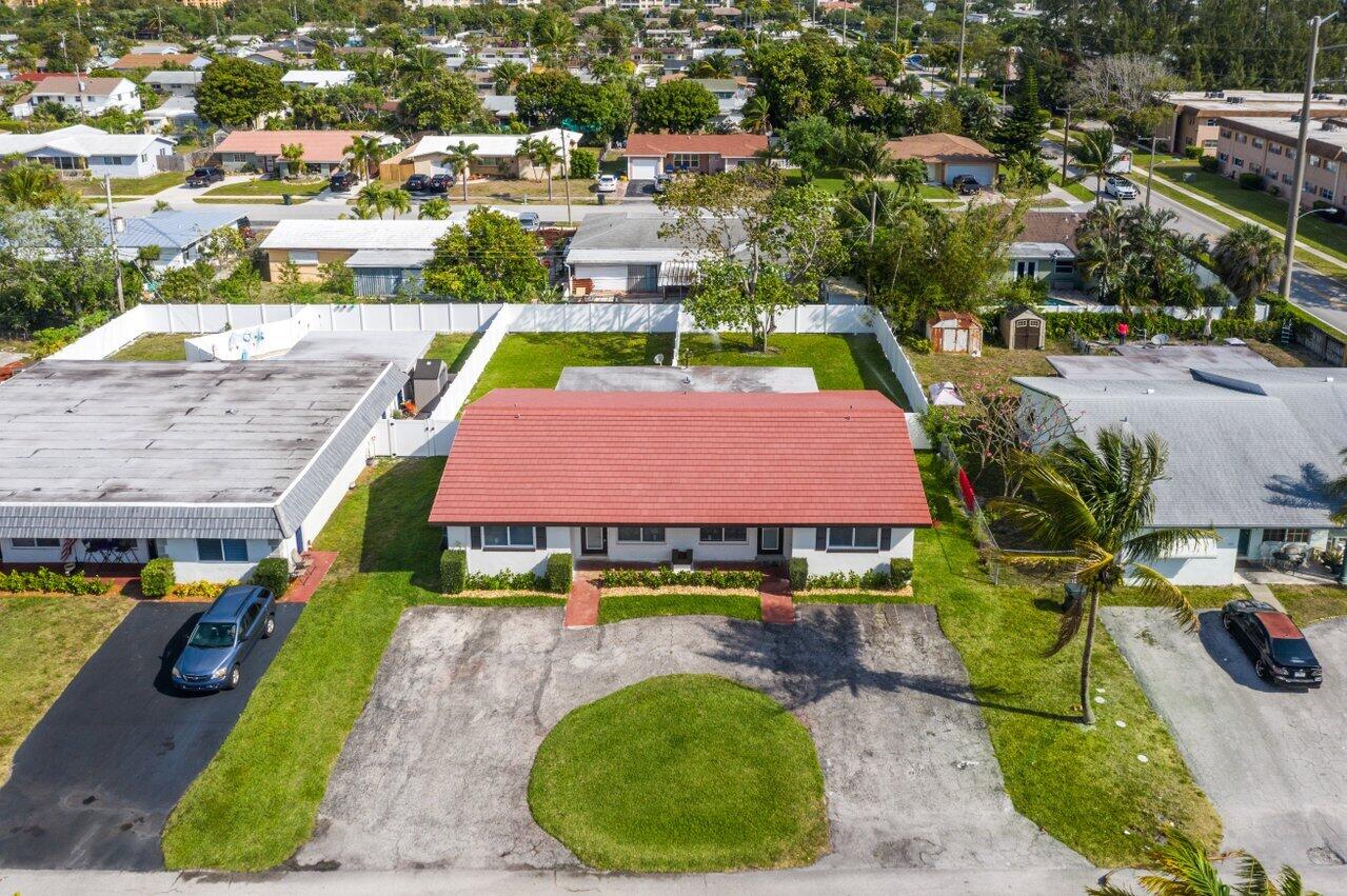 209 Southwest 6th Street, Unit 209 Boca Raton, FL 33432 - Photo 30 of 37 a view of a swimming pool with a patio