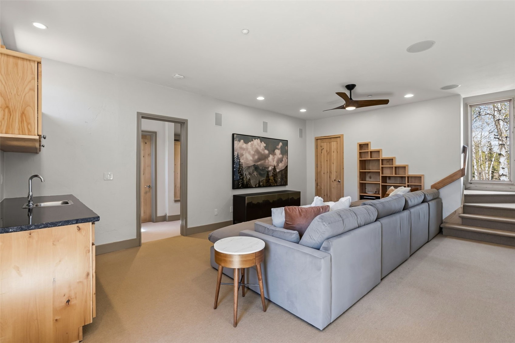 2800 Hunter's Knob Road Silverthorne, CO 80498 - Photo 17 of 37 a living room with furniture and a flat screen tv