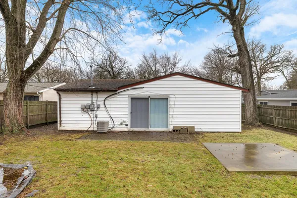 a house with trees in front of it
