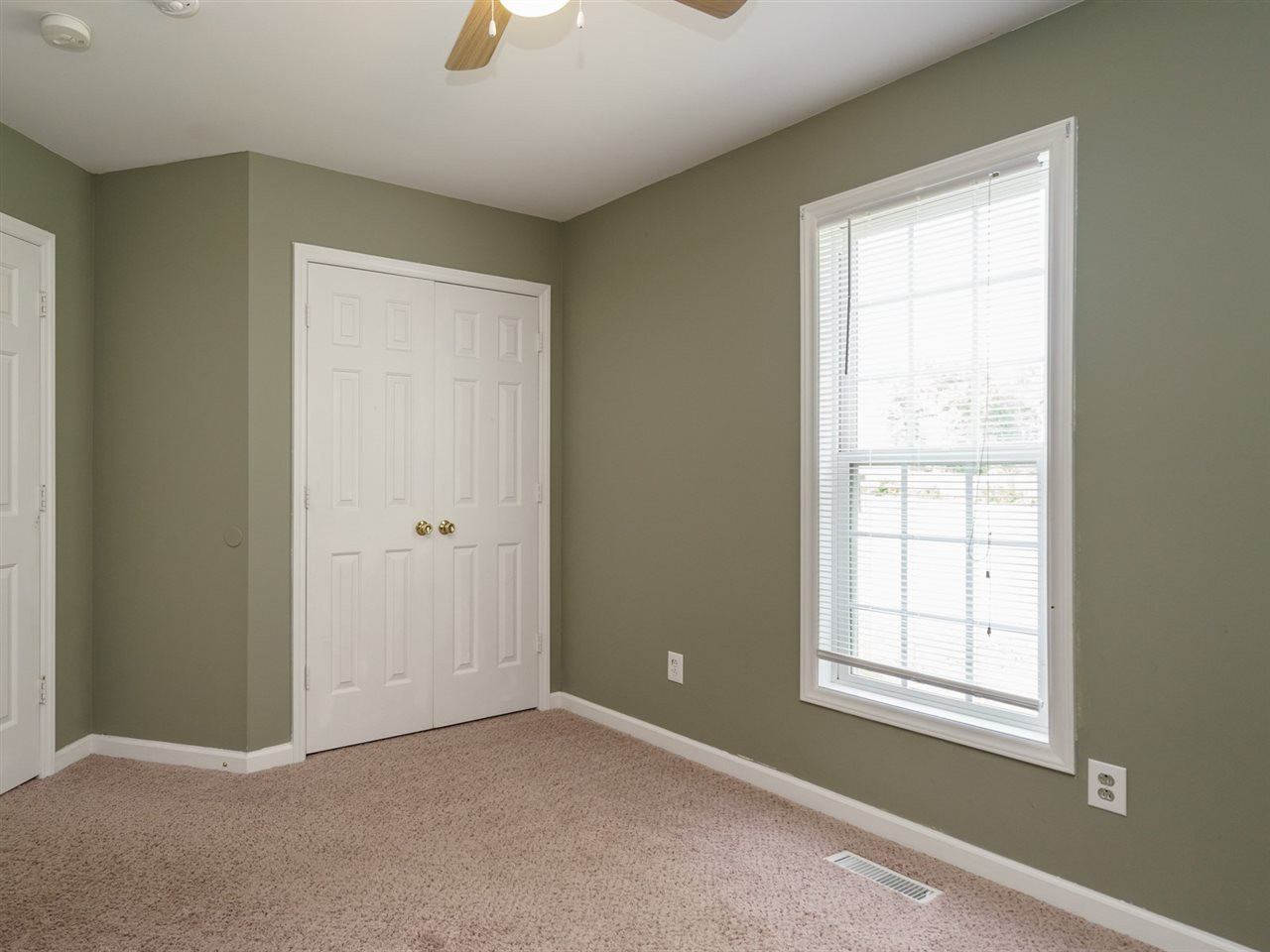 5692 Zacks Mill Road Angier, NC 27501 - Photo 19 of 25 Both secondary bedrooms have nicely-sized closets. Bedroom