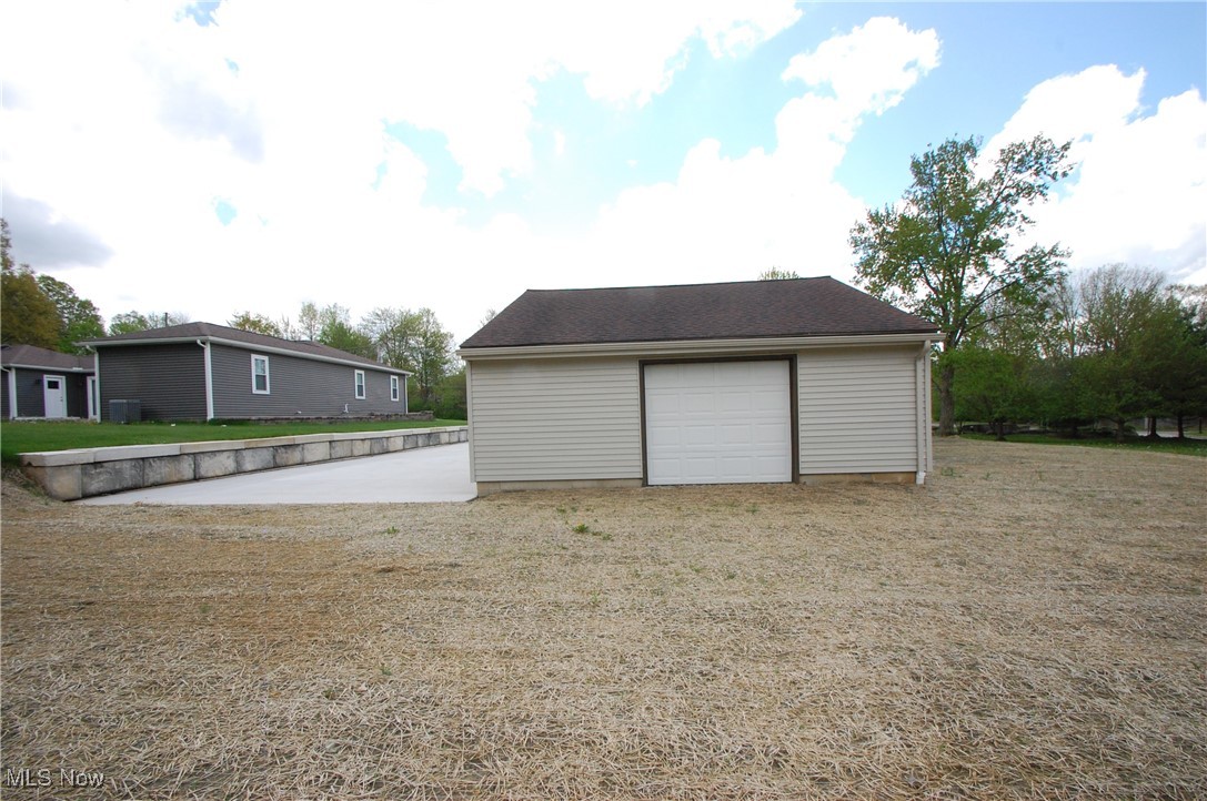 Detached garage with driveway