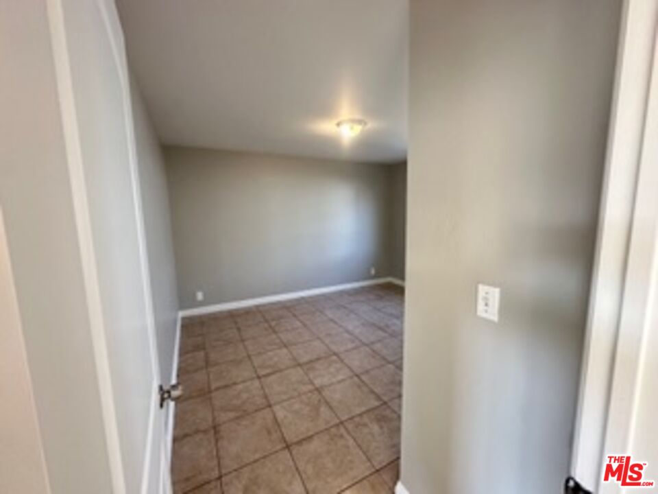 6137 Toltec Way, Unit 7 Los Angeles, CA 90042 - Photo 8 of 8 a view of an empty room and window