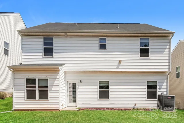 a front view of a house with garage