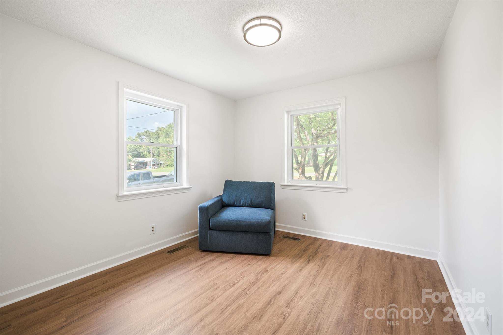 507 Shue Road China Grove, NC 28023 - Photo 21 of 34 an empty room with windows and closet