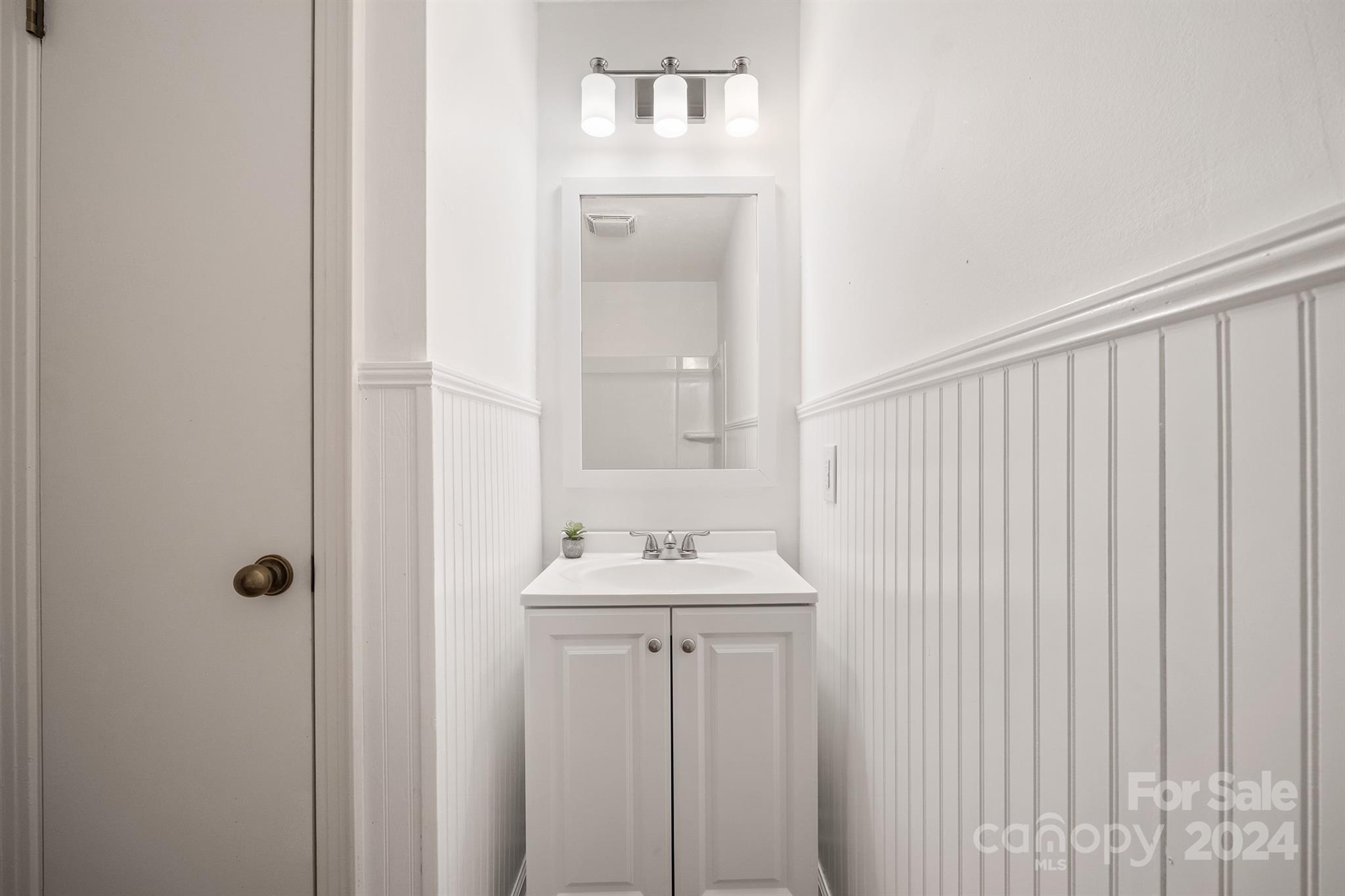 507 Shue Road China Grove, NC 28023 - Photo 26 of 34 a bathroom with a sink and a mirror
