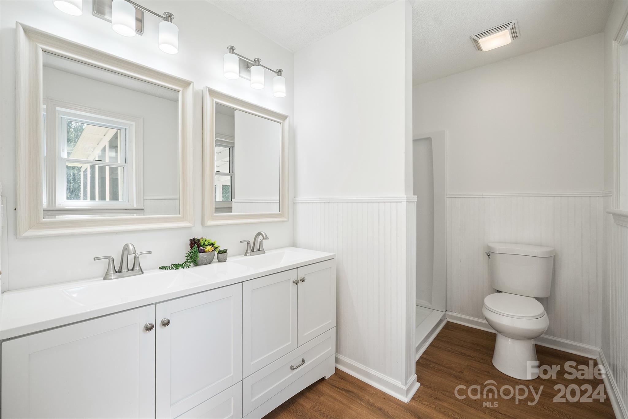 507 Shue Road China Grove, NC 28023 - Photo 28 of 34 a bathroom with a toilet sink and mirror