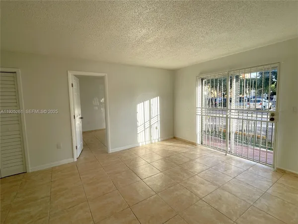 en empty room with windows