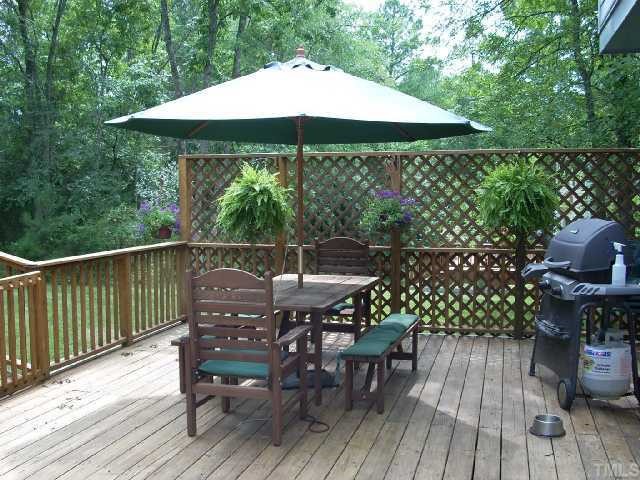 5321 Bakers Mill Road Durham, NC 27707 - Photo 11 of 12 a view of a roof deck with furniture