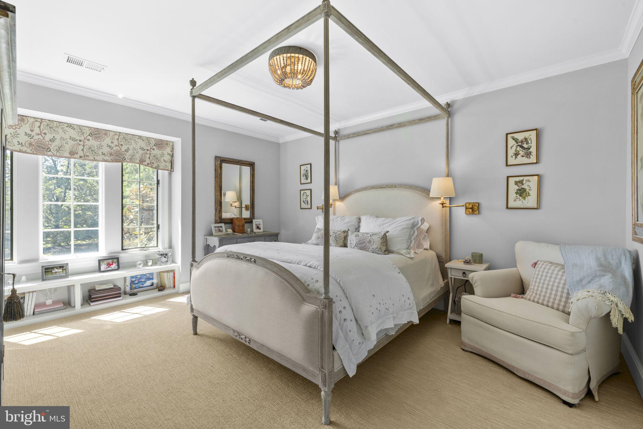 36190 Turkey Roost Road Middleburg, VA 20117 - Photo 49 of 88 a spacious bedroom with a bed couch and a large window
