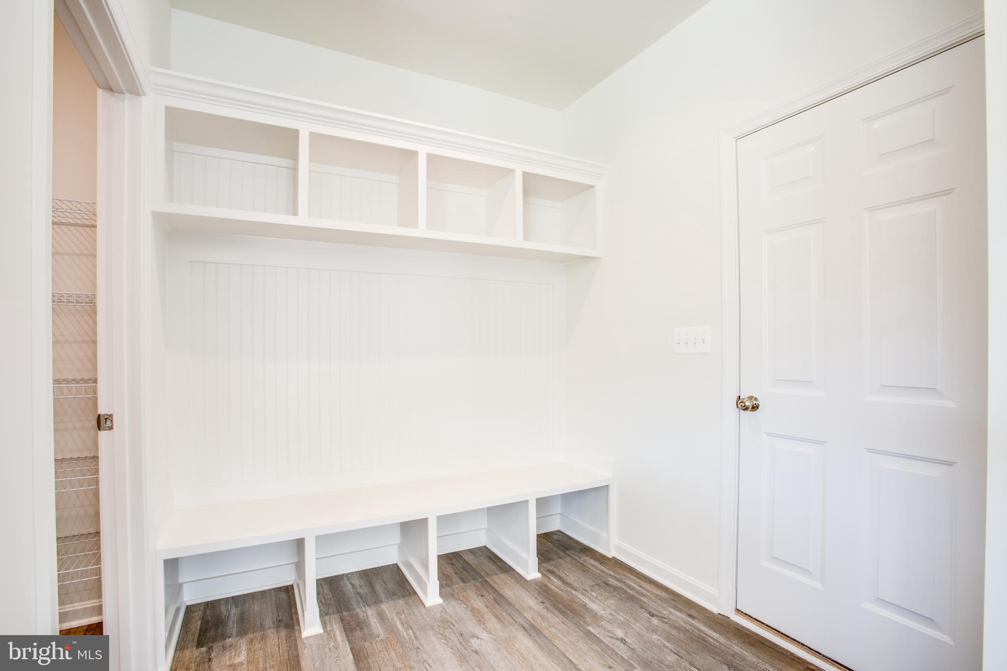 2107 Warrenton Road Fredericksburg, VA 22406 - Photo 3 of 58 a view of walk in closet with empty racks