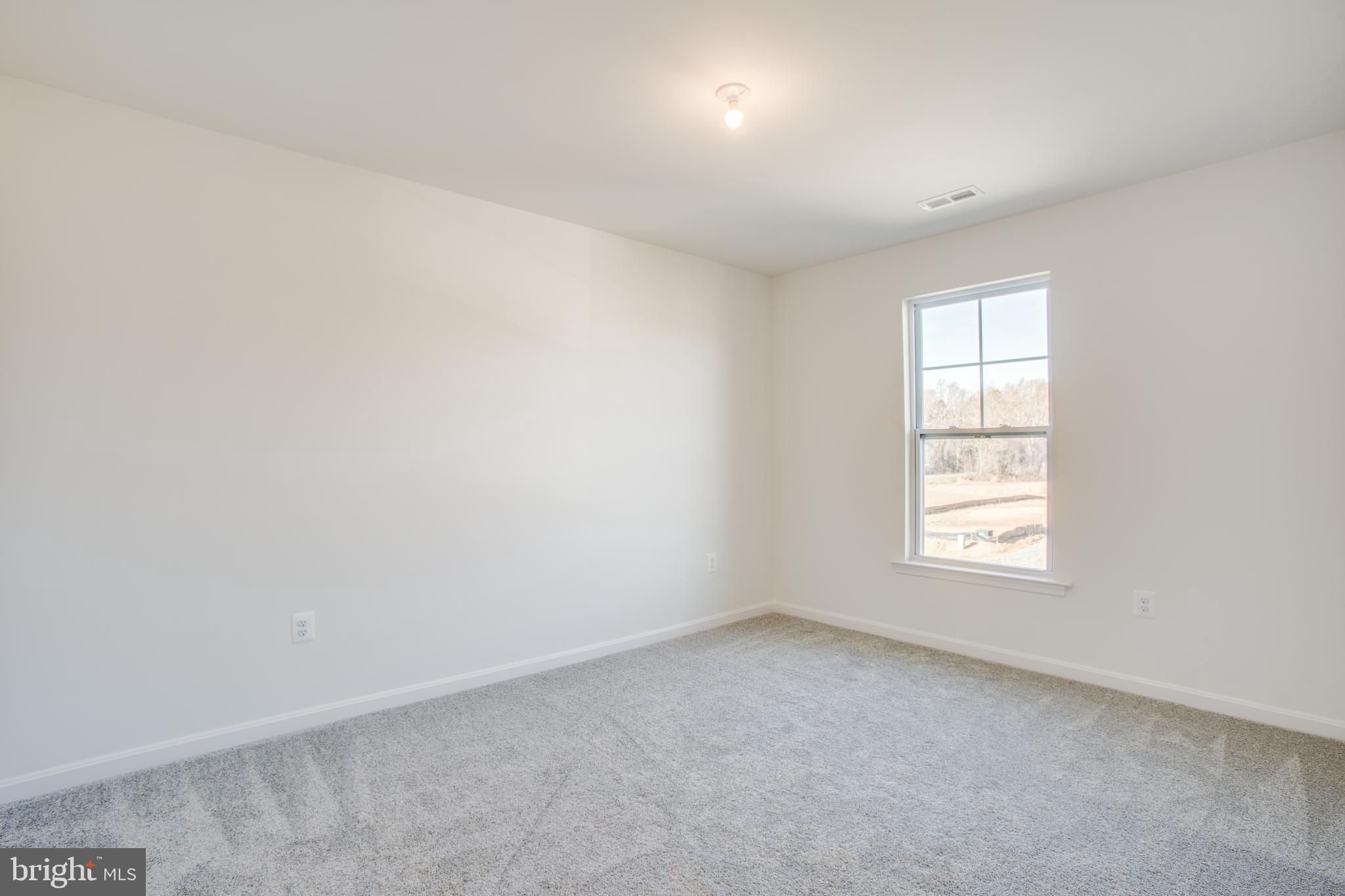 2107 Warrenton Road Fredericksburg, VA 22406 - Photo 34 of 58 an empty room with a window