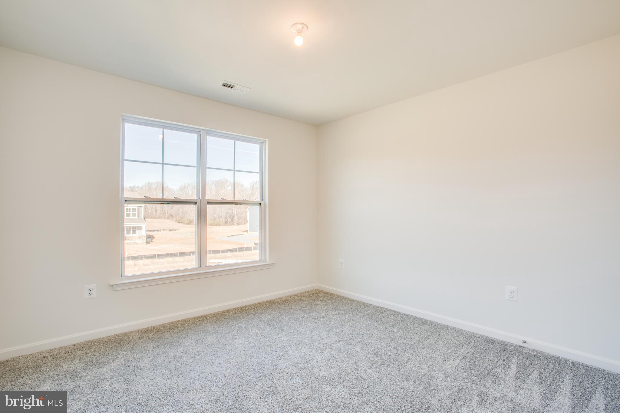 2107 Warrenton Road Fredericksburg, VA 22406 - Photo 37 of 58 an empty room with a window
