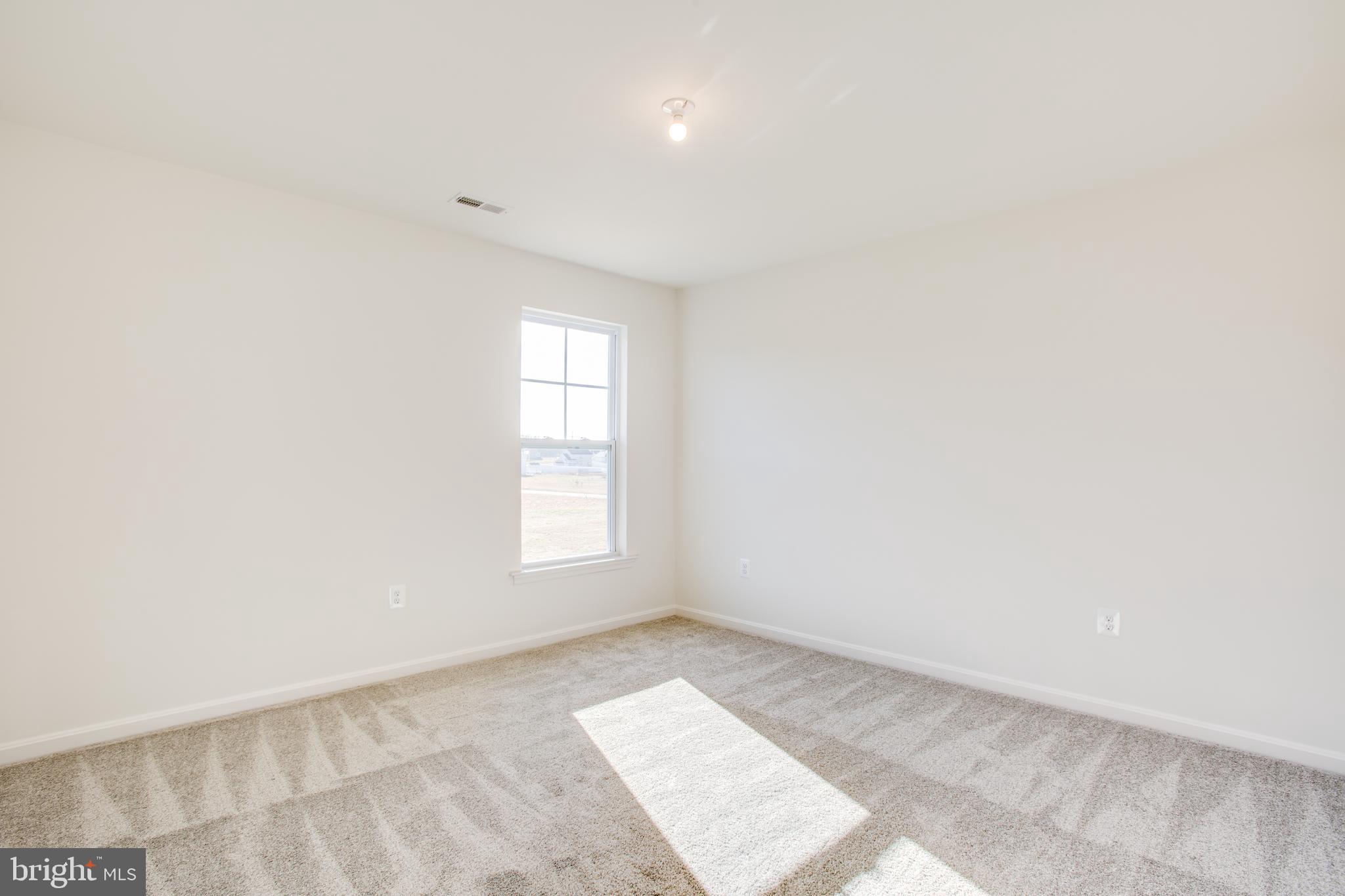 2107 Warrenton Road Fredericksburg, VA 22406 - Photo 40 of 58 an empty room with windows